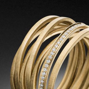 Kettenring Gelbgold 7 Einzelringe Diamanten Steinbach Goldschmiede