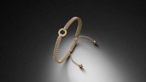 Makramee Armband Gelbgold Diamantring Verschlusskugeln Sand STEINBACH Goldschmiede