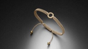 Makramee Armband Gelbgold Diamantring Verschlusskugeln Sand STEINBACH Goldschmiede